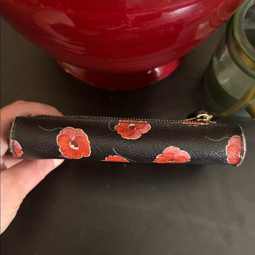 COACH bifold wallet with cute poppy print. Change pocket in back. Snap closure. - Picture 7 of 16